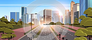 Highway asphalt road with marking arrows traffic signs city skyline modern skyscrapers cityscape sunshine background