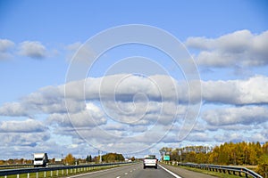 Highway, autobahn and road landscape. Automobile, cars and vehicles. Blue sky and sunny day. European autobahn
