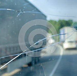 Highway through a broken windshield