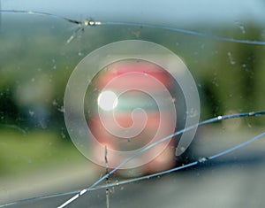 Highway through a broken windshield