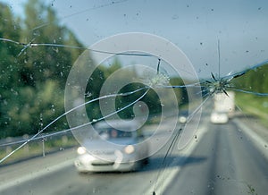 Highway through a broken windshield