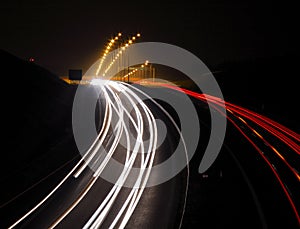 Highway with car lights trails