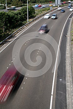 Highway with cars speeding