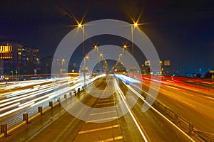 Highway through city at night