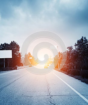 Highway, clouds and the blue sky