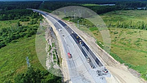 Highway construction. Development asphalt transport road. Top Aerial View.