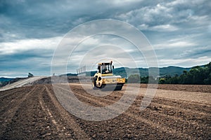 Highway construction site details - working tandem vibration machinery