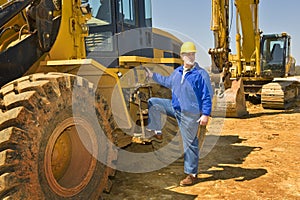 Highway Construction Worker With Equipment