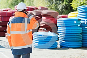 highway construction worker and heavy equipment