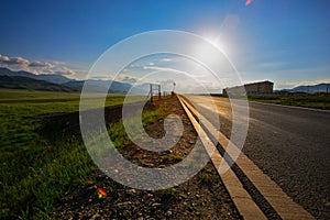 A highway crossing the plateau meadow