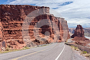 Highway descending to Lake Powell and Colorado River in Glen Canyon National Recreation Area