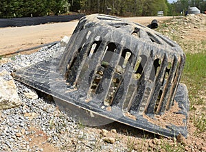 Highway drain grate on constrution site