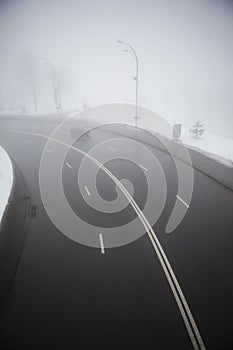 Highway in the fog in winter