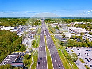 Highway or Freeway road. Low traffic on the way. Wide road with many lanes. Highway for any transportation. Road for cars and truc