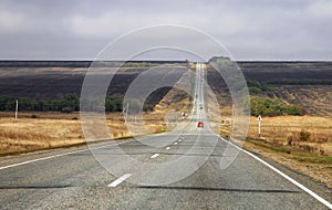 Highway landscape with moving cars at daytime