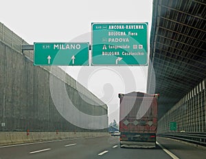 Highway junction in Northern Italy towards Milan and Bologna and the truck photo