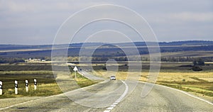 Highway landscape with moving cars at daytime