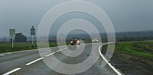 Highway landscape with moving cars at daytime