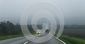 Highway landscape with moving cars at daytime