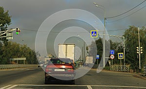 Highway landscape with moving cars at daytime