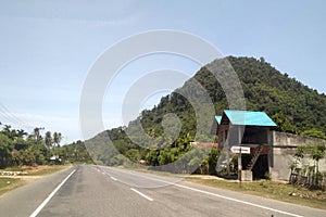 A highway in the Lhoknga area, Aceh Besar, Indonesia that passes through many mountains