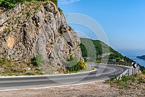 Highway in the mountains against the backdrop of the Adriatic Sea near Budva