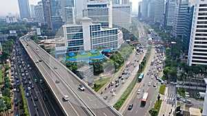 Highway multi-level interchange road with moving cars. Cars are moving on a road junction