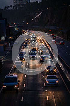 Highway multiple automobiles driving along the road at night