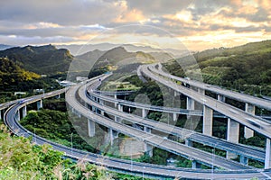 Highway in night with cars light in modern city in Taiwan, Asia