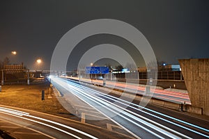 Highway at night with lighttrails