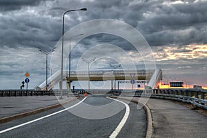 Highway over a dum at sunrise