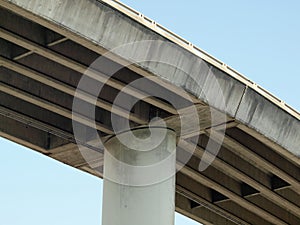 Highway overpass on large pillar towers in the sky