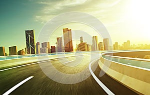 Highway overpass motion blur with city skyline background