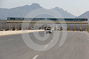 Highway of Pakistan welcome board road and mountains