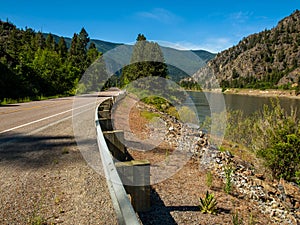 Highway Parallels a Wide Mountain River