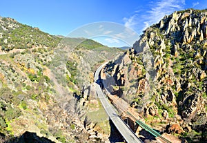 Highway and railway crossing Despenaperros national park in Nort photo