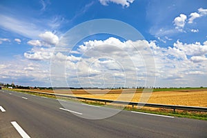 Highway road landscape blue sky white clouds field nature travel asphalt country journey summer empty rural horizon line view trip