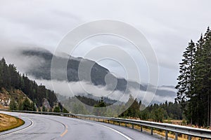 Highway road in a misty mountains of Norway