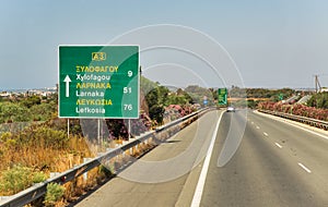 Highway road sign for the Larnaka city, Cyprus