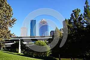 Highway Road Throung Downtown Houston in Sunset afternoon skyscrapers. Photo image