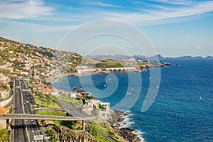 Highway road and traffic along the sea coast, Madeira Island