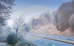 Highway, road trip and desert landscape for winter travel, holiday or natural scenery in countryside. Nature, trees and