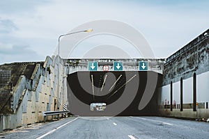 Highway road tunnel with 3 lane and 5.25 meter height limit road sign