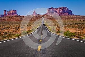 Highway Road U.S. Highway 163 and Monument Valley at sunset, Arizona, USA