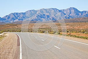 A highway running past the Flinders Ranges. South Australia.