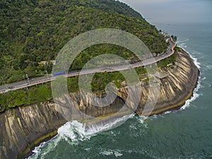Highway by the sea and bike path. Asphalt road beside the sea. Car advertising background.