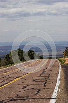Highway 89 seems to vanish into the valley below - Kaibab National Forest, Arizona photo