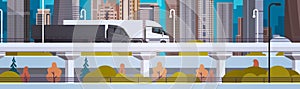 Highway With Semi Trucks Trailers Driving Over Modern City Buildings Horizontal Banner