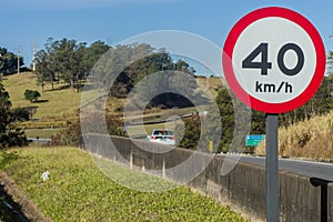 highway sign: 40km per hour, forty kilometers per hour