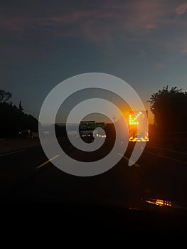 highway sign at dawn